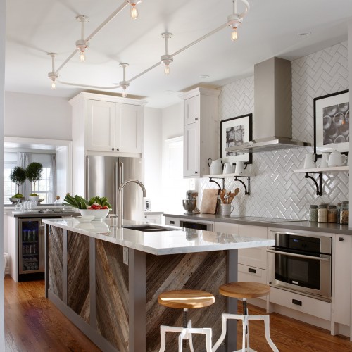 View of Fresh Country Kitchen's main space with the cooking area, appliances and ceiling lights